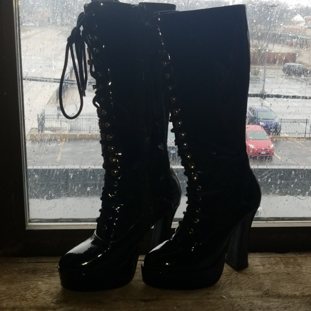 Black vinyl boots